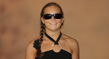 Stephanie, a past New Jersey scholarship winner, smiles.